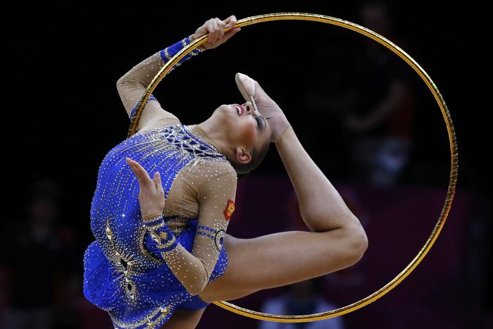 Фоторепортаж о выступлении Евгении Канаевой в финале олимпийских соревнований по художественной гимнастике. Фото: Jamie Squire / Getty Images